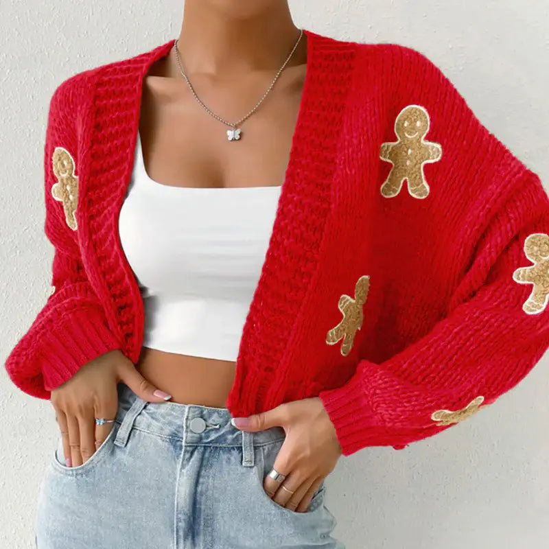 Green knitted cardigan with gingerbread appliqués — cozy holiday women’s sweater
