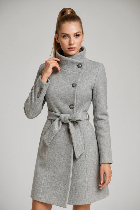 Elegant women's grey trench coat with high collar, belted waist and button closure